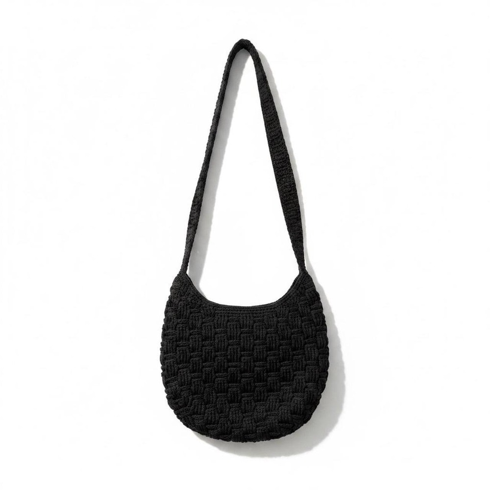 The Sak black woven textured handbag
